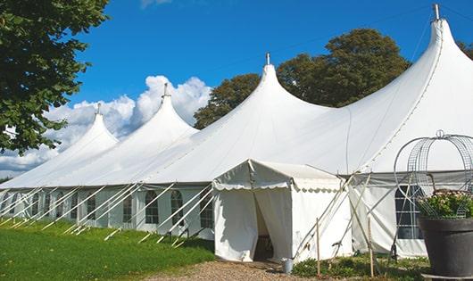 a group of luxury portable restrooms with individual stalls and running water in Dacono CO